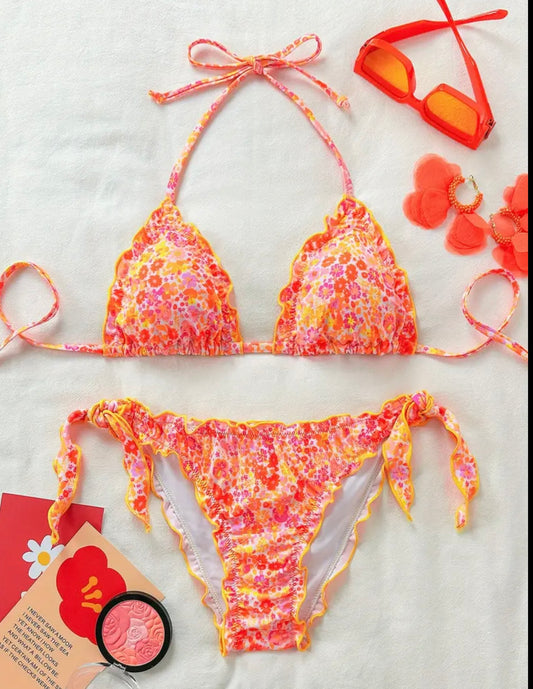 woman’s neon floral bikini set